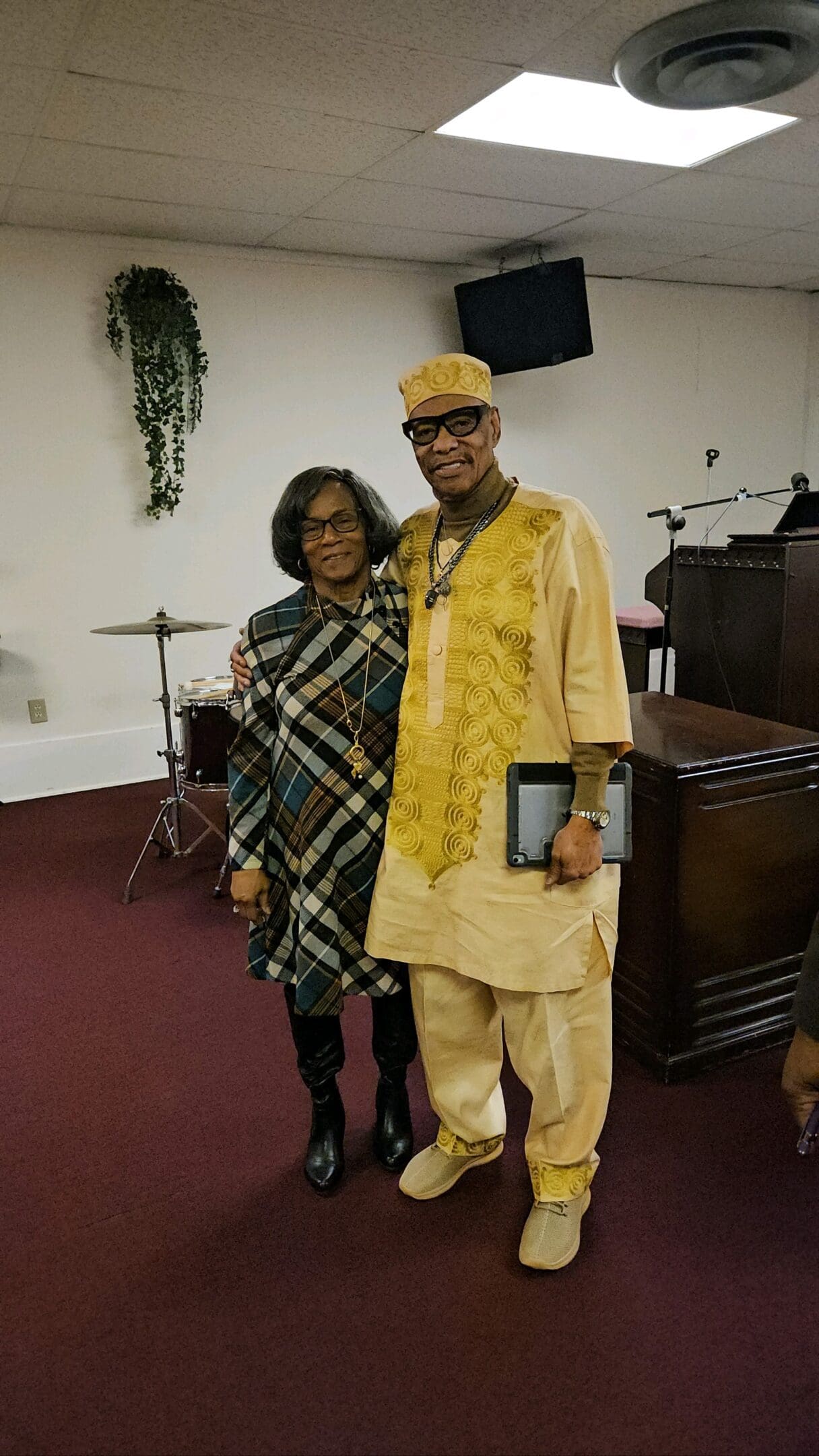 A man and woman standing next to each other.